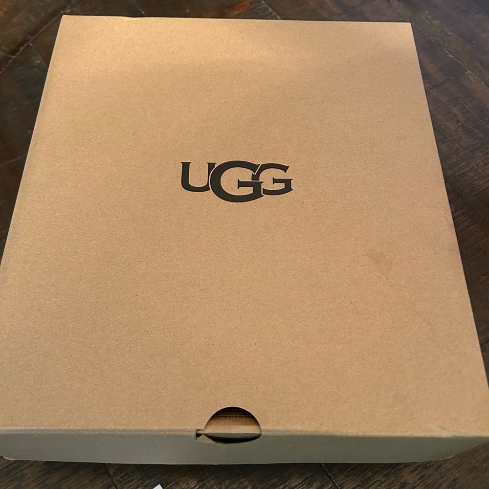 Natural colored Ugg boots, fur inside with tall heel.